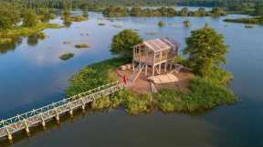 365 Days in Isolation: A girl builds a wooden house on a deserted island.| by @LyThiHoa1987